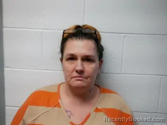 Mugshot of MELISSA ANN COATES booked in Grant County, Kentucky on May 6, 2026