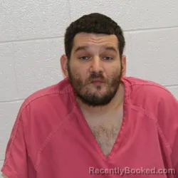 Mugshot of NICKALOS AARON JEREMIAH