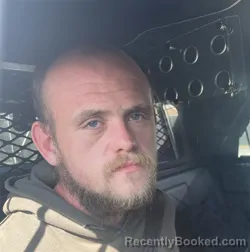 Mugshot of TYSON T POWELL