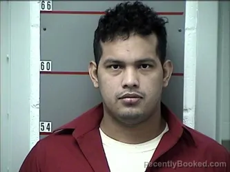 Mugshot of EDISON TOMALA BAJANA