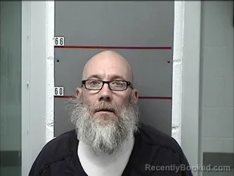 Mugshot of JUSTIN SHUFELT