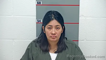 Mugshot of LITZA LILY OSORIO CALIDONIO