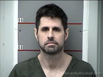 Mugshot of JONATHAN TRAVIS MACKEY