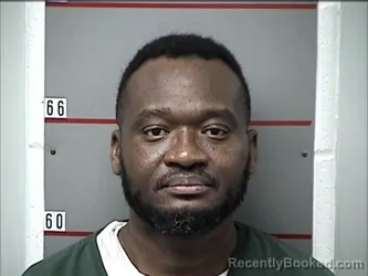 Mugshot of KOMLAN BALOVI BOUAKA