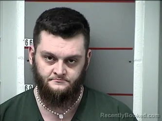 Mugshot of TUNNAT COZMO MATTHEW