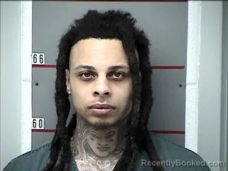 Mugshot of QUSHAWN HIWATHA DENARD REID booked in Grayson County, Kentucky on March 31, 2026