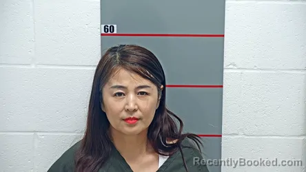 Mugshot of GUIJIE WANG booked in Grayson County, Kentucky on March 31, 2026