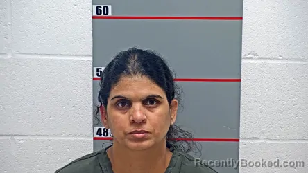 Mugshot of Reena Reena booked in Grayson County, Kentucky on October 21, 2026