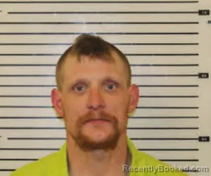 Mugshot of CAMERON MITCHELL PLEMMONS booked in Madison County, North Carolina on March 23, 2026