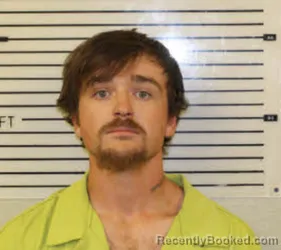 Mugshot of ISAAC TYLER SURRETT booked in Madison County, North Carolina on April 18, 2026