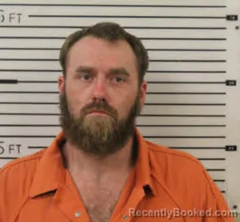 Mugshot of JOSHUA COLTON LINDSEY booked in Madison County, North Carolina on July 14, 2026