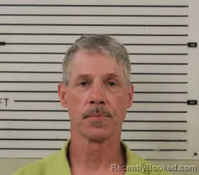 Mugshot of ERIC JAMES DUCKER booked in Madison County, North Carolina on July 8, 2026
