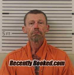 Mugshot of WALTER LEO REVIS booked in Madison County, North Carolina on June 10, 2026