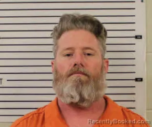 Mugshot of JACOB EDWARD WILSON booked in Madison County, North Carolina on April 15, 2026