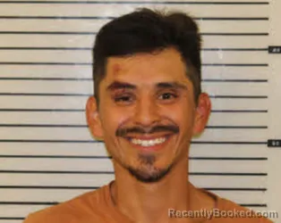 Mugshot of Elijah Wayne John booked in Madison County, North Carolina on August 22, 2026