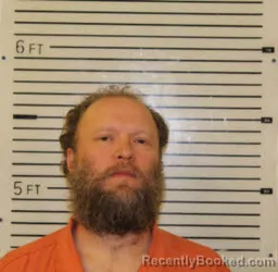 Mugshot of Joshua Stephen Hogan booked in Madison County, North Carolina on September 9, 2026