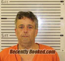 Booking photo from Madison County, North Carolina