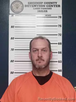 Mugshot of JUSTIN CLARK booked in Greenup County, Kentucky on August 4, 2026