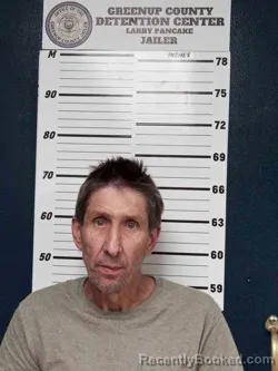 Mugshot of DEREK MCDAVID booked in Greenup County, Kentucky on April 6, 2026