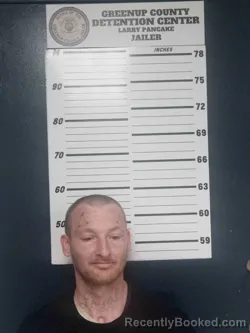 Mugshot of ROBERT HOUSINGER booked in Greenup County, Kentucky on April 7, 2026