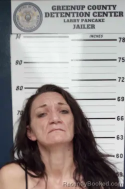 Mugshot of ASHLEY MUNION booked in Greenup County, Kentucky on March 28, 2026