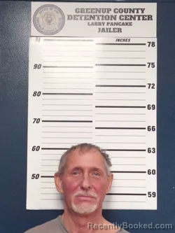 Mugshot of RAYMOND MCCLURG booked in Greenup County, Kentucky on April 24, 2026