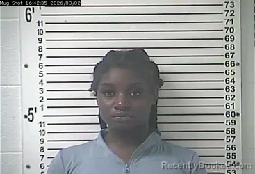 Mugshot of AMINA DENISE TOURAY
