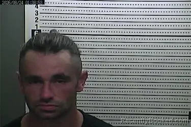Mugshot of Austin Cain booked in Harlan County, Kentucky on August 24, 2026