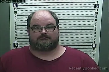 Mugshot of Aaron Thomas booked in Harlan County, Kentucky on September 14, 2026