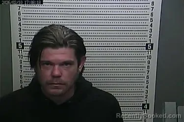 Mugshot of EDDIE RUSHER