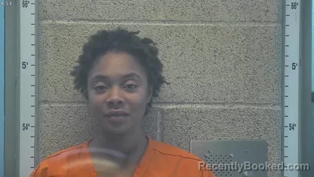 Mugshot of PRECIOUS M REYNOLDS