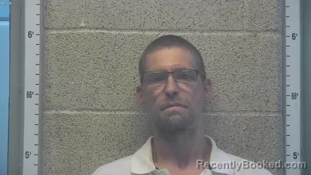 Mugshot of ANDREW JAY SETTLE booked in Henderson County, Kentucky on April 23, 2026