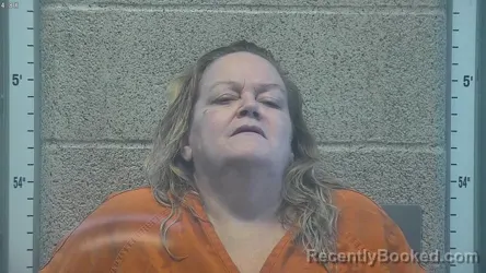 Mugshot of JENNIFER LYNN HIGGINS booked in Henderson County, Kentucky on May 14, 2026