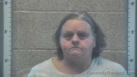 Mugshot of PATRICIA SANDERFUR booked in Henderson County, Kentucky on June 14, 2026