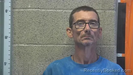 Mugshot of MICHAEL SCOTT POWELL booked in Henderson County, Kentucky on July 14, 2026