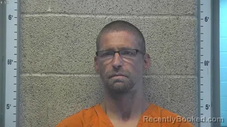 Mugshot of ANDREW JAY SETTLE booked in Henderson County, Kentucky on July 14, 2026
