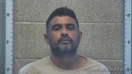 Mugshot of Miguel Sandoval booked in Henderson County, Kentucky on August 7, 2026