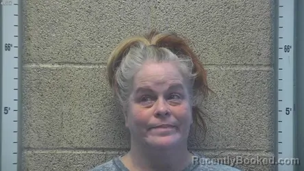 Mugshot of Amoreena Jenista Kinzie booked in Henderson County, Kentucky on August 17, 2026