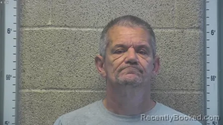 Mugshot of John Alan Williams booked in Henderson County, Kentucky on August 18, 2026