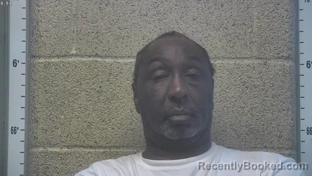Mugshot of Russell Wayne Burrus booked in Henderson County, Kentucky on October 4, 2026