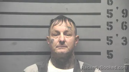 Mugshot of MICHAEL SEAN . ANOMAN