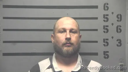 Mugshot of Adam Lee Burden booked in Hopkins County, Kentucky on August 29, 2026