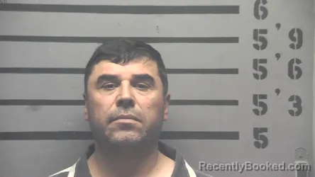 Mugshot of SUKHROB BAKIEV booked in Hopkins County, Kentucky on April 22, 2026