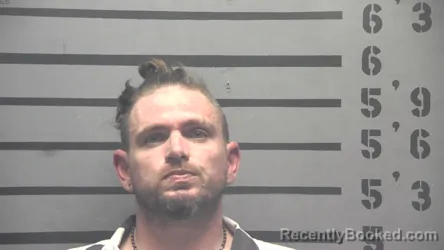 Mugshot of TRAVIS LYN DOROUGH