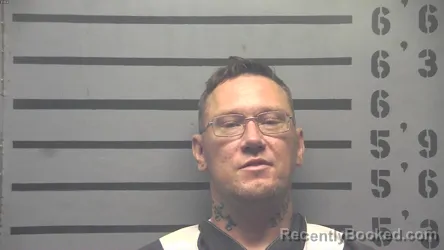 Mugshot of JOHN WILSON ENNIS booked in Hopkins County, Kentucky on July 3, 2026