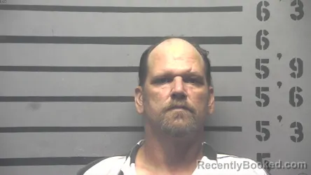 Mugshot of Travis Neal Faulk booked in Hopkins County, Kentucky on August 21, 2026