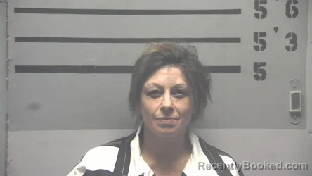 Mugshot of BRANDI JEAN HALLUM booked in Hopkins County, Kentucky on April 30, 2026