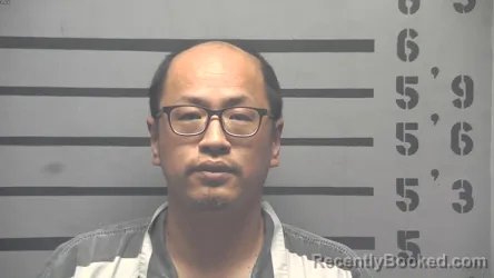 Mugshot of JIANWEI LUO booked in Hopkins County, Kentucky on April 22, 2026