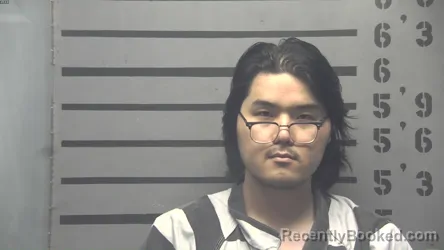 Mugshot of Wentao Liu booked in Hopkins County, Kentucky on September 14, 2026