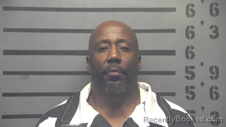Mugshot of DUWAYNE MICHAEL SR MOORE booked in Hopkins County, Kentucky on June 20, 2026